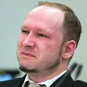 Anders Breivik listens to proceedings in court