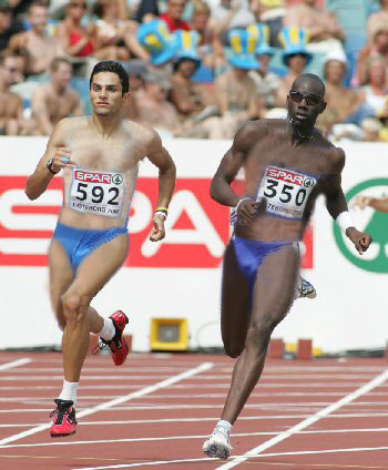 Two men sprinters have been photoshopped to make their uniforms look like the women's uniforms