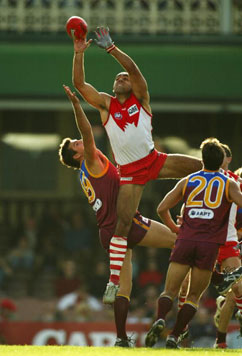 Adam Goodes takes a mark for Sydney Swans