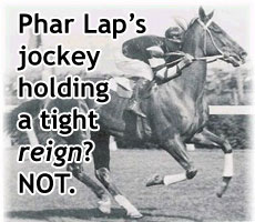 Champion racehorse Phar Lap heading for the finish line, tightly directed by his jockey