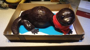 Shiny otter shaped cake