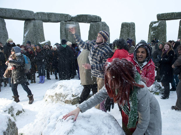 A snowball fight marks the 2010 winter solstice at Stonehenge on Salisbury plain in southern England December 22, 2010