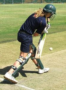 Ellyse Perry plays a forward defensive shot