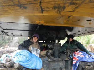 Two 60+ year old women sitting under a huge piece of machinery, locked on to defend logging coupes near Toolangi. Photo from Regnans Tree FB group
