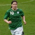 Taylor running, in Irish soccer kit