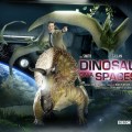 The first thing we notice is what appears to be a museum exhibit showing a stegosaurus and two pterodactyls, then it registers that they're standing in a corridor next to a picture window through which we can see planet Earth and its Moon - then we notice that the Doctor is riding the stegosaurus.