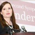 Head-and-shoulders photo of Geena Davis, at a podium, at the Gender in the Media Symposium.