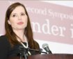 Head-and-shoulders photo of Geena Davis, at a podium, at the Gender in the Media Symposium.