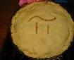 A pie with the symbol Pi carved into its crust.