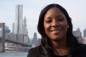 Zerlina Mazwell in front of a city skyline
