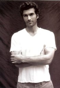 publicity headshot of Sendhil Ramamurthy, a young man of South Asian appearance