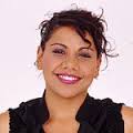 Colour headshot of Deborah Mailman in a black blouse, smiling.