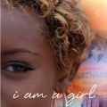 quarter face of black teenage girl with the inscription "i am a girl".