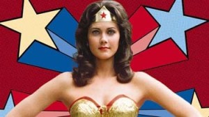 Lynda Carter in WW costume, background of drawn shooting stars.