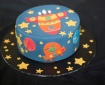 Cake decorated with rocket ship patterns