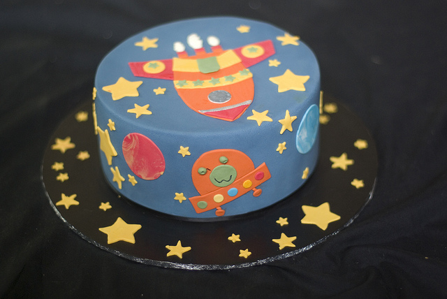 Cake decorated with rocket ship patterns