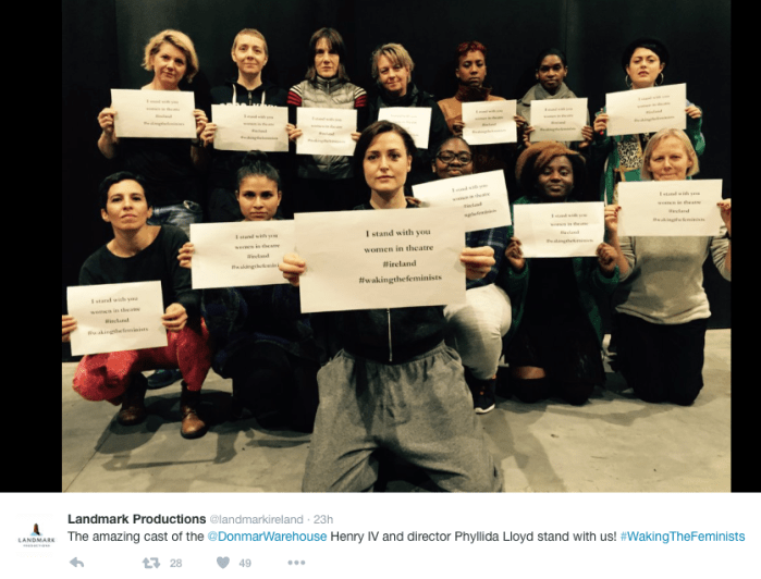 Group of women of many ages and races holding up signs reading "I stand with you, women in theatre. #Ireland"